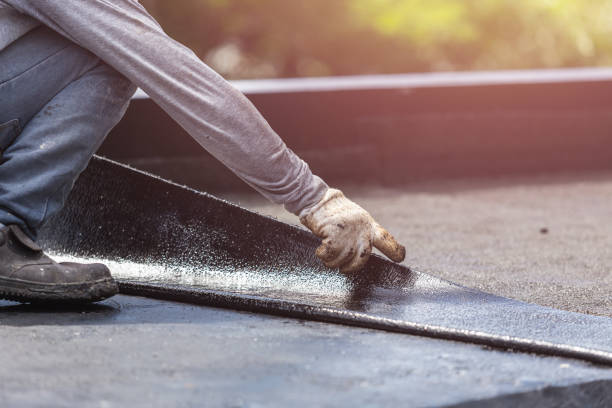 Professional Emergency Waterproofing technician working in Chelsea, MI